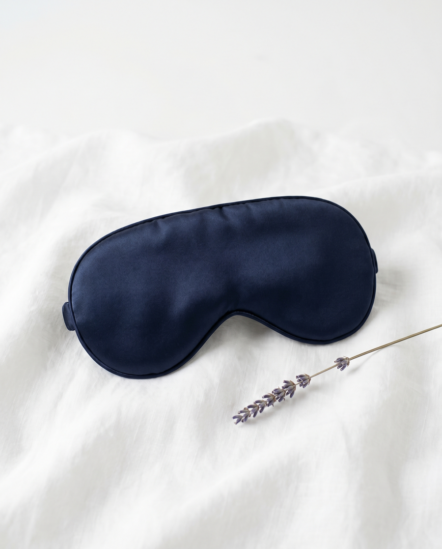 Voilune Silk Sleep Mask — 22-momme mulberry silk, flat lay with lavender